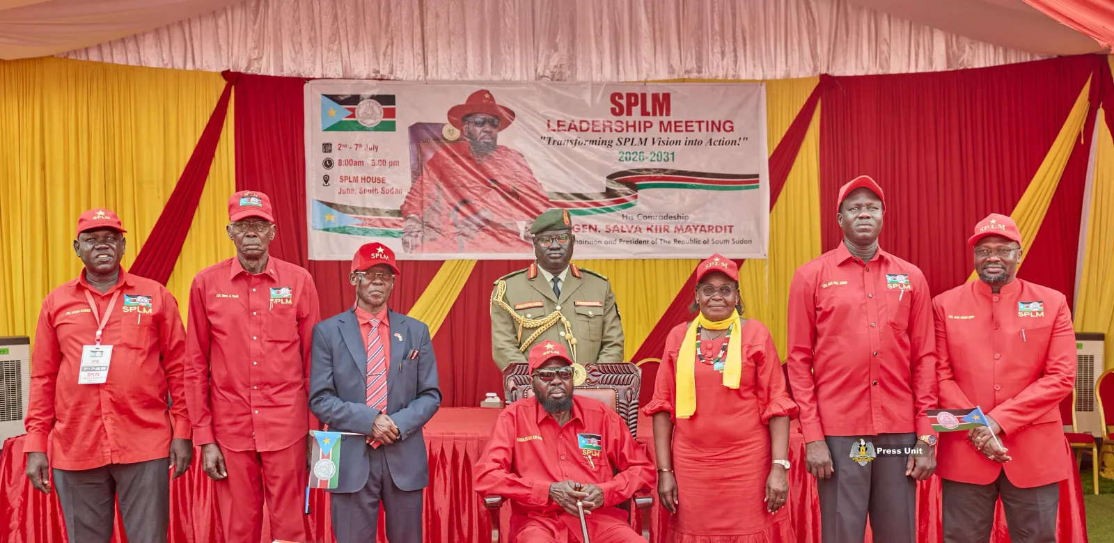 SPLM Chairman Cde. Salva Kiir Mayardit seated with senior party leaders in red SPLM uniforms at the SPLM Leadership Meeting, SPLM House, Juba.